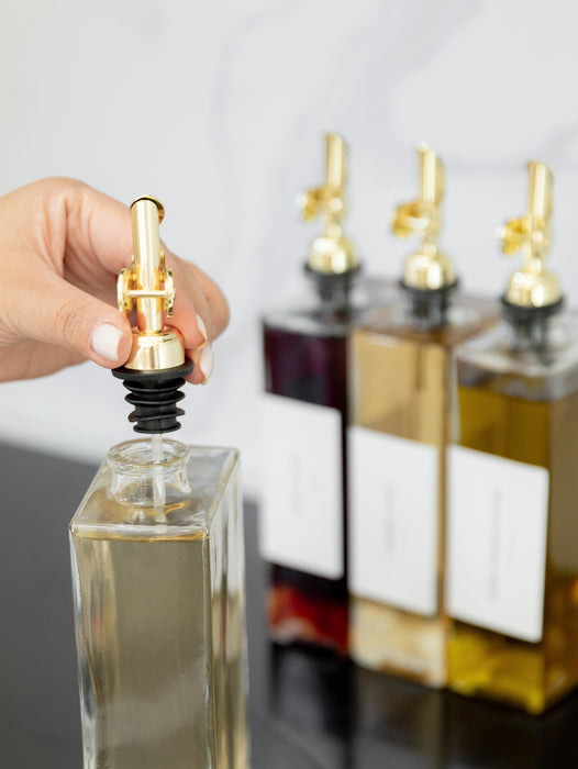 Oil and vinegar book bottle. sleek and elegant oil bottles. Refillable glass bottles.